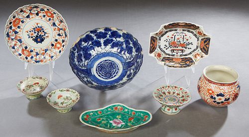 Group of Eight Pieces of Oriental Porcelain, 19th/20th c., consisting of an Imari baluster vase; a large Japanese Arita bowl; three diminutive Chinese