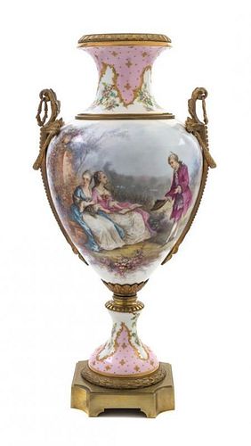 A Sevres Gilt Bronze Mounted Porcelain Urn Height 25 1/4 inches.