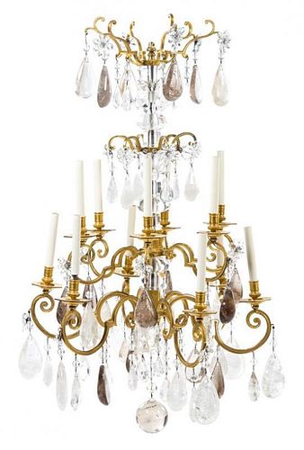 A Continental Gilt Bronze and Rock Crystal Twelve-Light Chandelier Height 45 x diameter 28 inches.