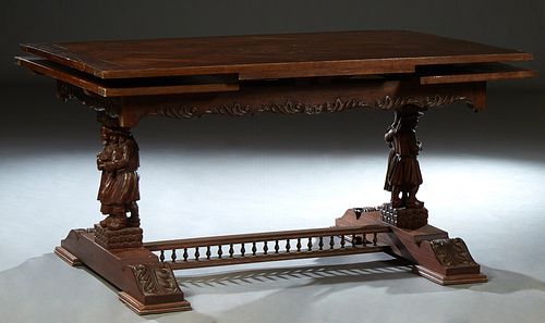 French Provincial Carved Oak Drawleaf Farmhouse Table, early 20th c., Brittany, the rectangular parquetry inlaid top on figural carved supports, with 