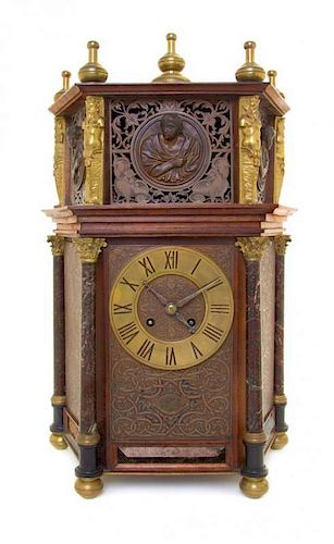 A French Gilt Metal and Marble Mounted Bracket Clock Height 17 1/2 x width 10 1/4 x depth 5 3/4 (without frame).