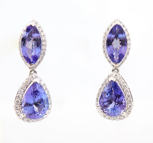 Pair of Platinum Pendant Earrings, the stud with a marquise tanzanite atop a border of round diamonds suspending a pear shaped tanzanite atop a border
