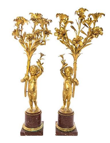 A Pair of Continental Gilt Bronze and Marble Three-Light Candelabra Height 37 1/2 inches.