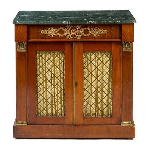 * An Empire Gilt Metal Mounted Mahogany Chiffonier Height 35 x width 35 1/4 x depth 18 1/2 inches.