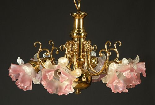 Spanish Gilt Brass Six Light Chandelier, 20th c., with a cylindrical support with a bottom brass globe, issuing six curved arms with frosted glass pin
