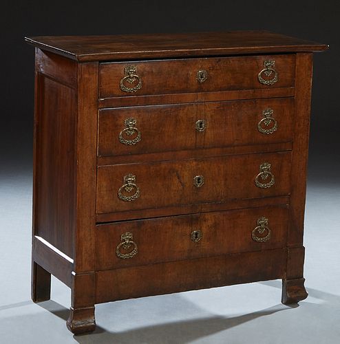 French Empire Style Carved Poplar Commode, 19th c., the rectangular top over a bank of four drawers, on a plinth base on block feet, H.- 34 3/4 in., W