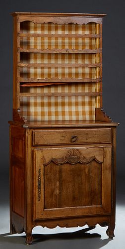 Unusual French Provincial Louis XV Style Carved Walnut Confiturier/ Vaisselier, 19th c., the stepped crown over three plate racks on a stepped canted 
