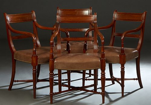 Set of Four English Carved Mahogany Armchairs, 20th c., the canted back with an incised carved crest rail and horizontal splat, to reeded curved arms 