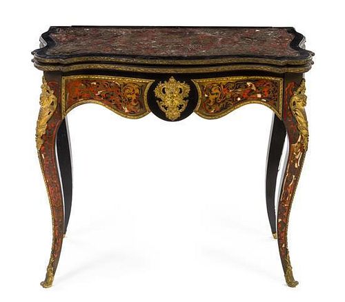A Napoleon III Gilt Bronze Mounted Boulle Marquetry Game Table Height 30 3/4 x width 35 x depth 18 inches.