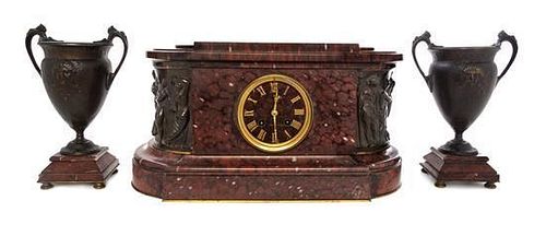 A French Cast Metal and Marble Clock Garniture Height 9 x width 16 1/4 x depth 7 inches.