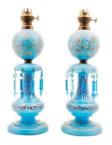 * A Pair of French Enameled Opaline Glass Oil Lamps Height overall 27 inches.