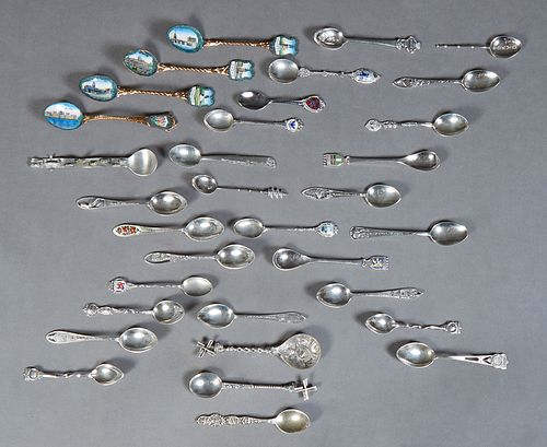 Group of Thirty-Three Souvenir Spoons, eight of base metal, some with enameled bowls; twenty-five of sterling or .800 silver, Wt.- 7.5 Troy Oz. (33 Pc
