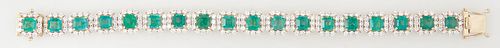 18K Yellow Gold Link Bracelet, each of the eighteen octagonal links mounted with a step cut octagonal emerald atop a border of small round diamonds, T