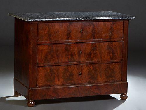 French Louis Philippe Carved Cherry Marble Top Commode, 19th c., the reeded edge rounded corner highly figured gray marble over three deep drawers on 