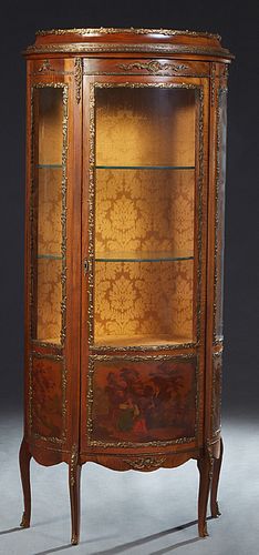 French Louis XV Style Carved Mahoghany Vernis Martin Style Curved Glass Vitrine, early 20th c., the stepped oval top over a center door with a curved 