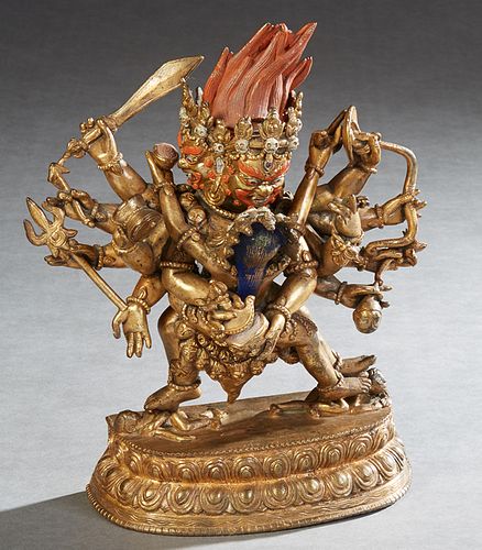 Tibetan-Chinese Bronze Figure of Ten Arm Samvara and Consort, 19th c., with polychromed decoration, on a stepped integral base with relief decoration,