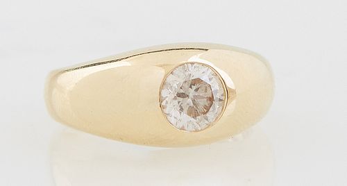 Lady's 18K Yellow Gold Dinner Ring, with a center 1.35 ct. round diamond, on a wide tapering band, Size 9 1/2, with appraisal.