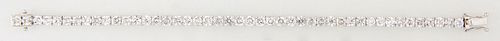 18K White Gold Diamond Tennis Bracelet, each of the 45 square links with a graduated round diamond, total diamond wt.- 10.62 cts., L.- 7 1/8 in., with