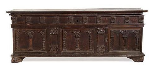 * A Continental Carved Cassone Height 19 x width 54 x depth 21 inches.