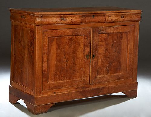 French Provincial Louis Philippe Carved Oak Sideboard, 19th c., the rectangular rounded corner top over three frieze drawers above double cupboard doo
