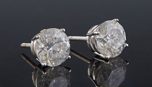 Pair of 18K White Gold Round Diamond Stud Earrings, one 2.13 cts., one 2.14 cts., total 4.27 with screw posts, cts., with appraisal.