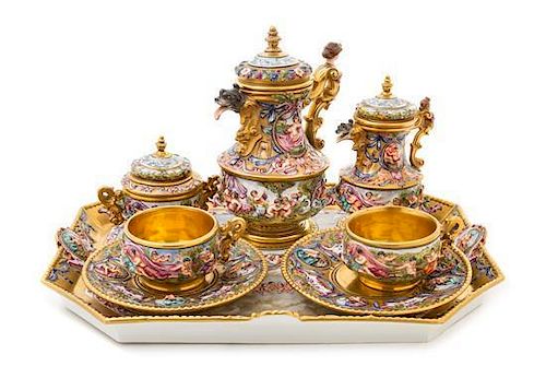 * A Capo-di-Monte Porcelain Tete-a-Tete Height of first 7 3/4 inches.