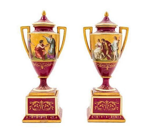 * A Pair of Royal Vienna Porcelain Urns Height 11 1/2 inches.