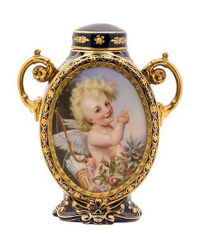 * A Continental Porcelain Tea Caddy Height 6 inches.