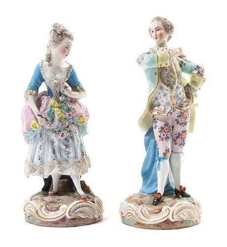 * A Pair of Continental Porcelain Figures Height 9 inches.