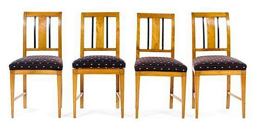 * A Set of Four Biedermeier Parcel Ebonized Satinwood Side Chairs Height 34 inches.