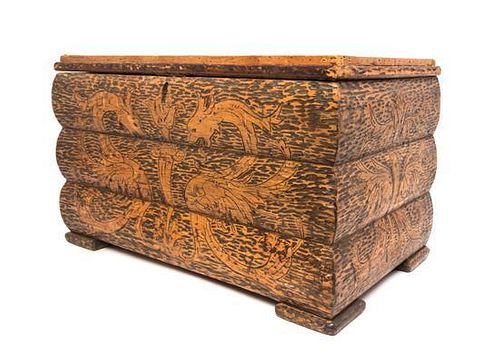 A Scandinavian Pyrographic Decorated Trunk Height 15 x width 24 3/4 x depth 15 inches.