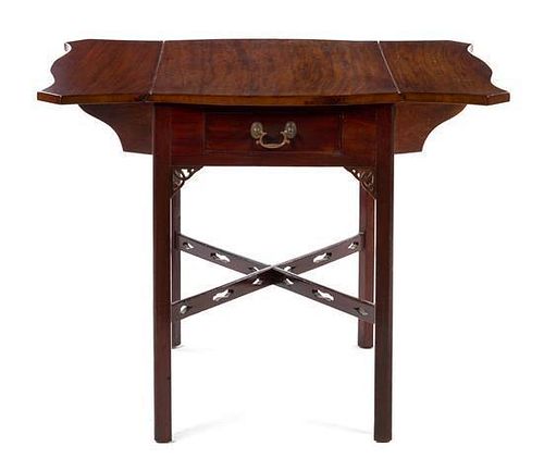 A Chippendale Style Mahogany Pembroke Table Height 27 x width 35 1/2 x depth 27 3/4 inches (open).