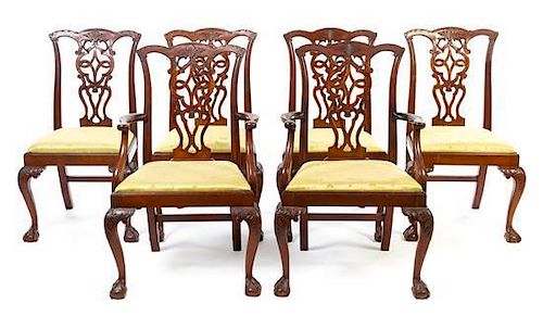 * A Set of Eight Chippendale Style Mahogany Dining Chairs Height 39 1/2 inches.