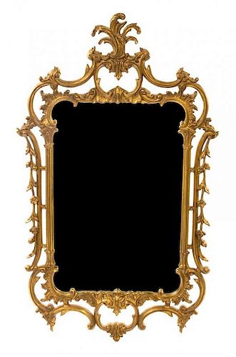 * A George III Style Giltwood Mirror Height 49 x width 29 inches.
