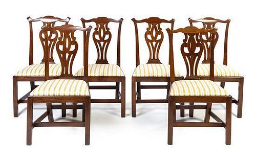 A Set of Six Chippendale Style Mahogany Dining Chairs Height 37 1/2 inches.