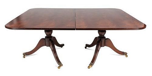 A Regency Style Mahogany Extension Table Height 72 x width 54 x length 117 1/2 inches (fully extended).