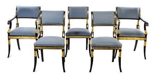 * A Set of Eight Regency Style Parcel Gilt and Ebonized Dining Chairs Height 36 inches.