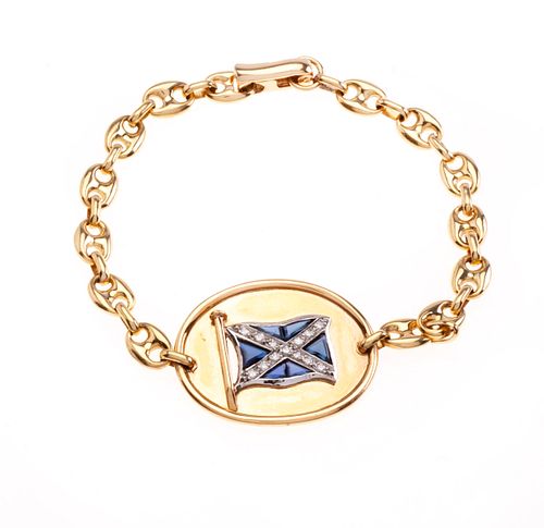 Esclava con zafiros y diamantes en oro amarillo de 18k. Con la bandera de Escocia. Peso: 17.4 g.