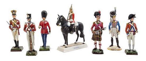 * A Collection of Porcelain Military Figures Height of tallest 12 1/2 inches.