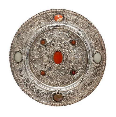 A Continental Hardstone Inset Silver Charger, , having rocaille shells, lattice and floral repousse decoration throughout.