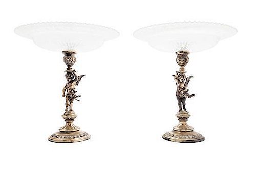 * A Pair of German Etched Glass and Silvered Figural Compotes Height 9 1/2 inches.
