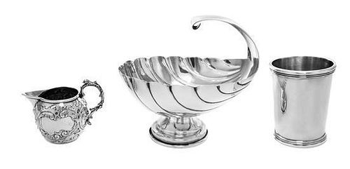 * Three Silver Table Articles, 19th/20th Century, comprising a German creamer, a Mexican beaker and a scalloped dish.