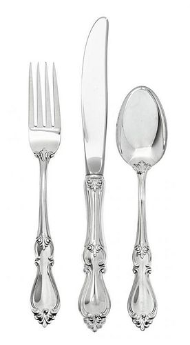 An American silver Flatware Service, Towle Silversmiths, Newburyport, MA, Queen Elizabeth I pattern, comprising: 7 dinner knives