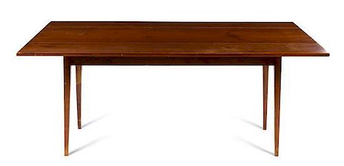 An American Pine Drop Leaf Table Height 29 1/4 x width 72 x depth 21 1/4 inches (closed).