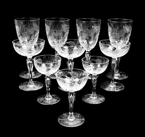 A Cut Glass Stemware Service Height of water glasses 8 inches.