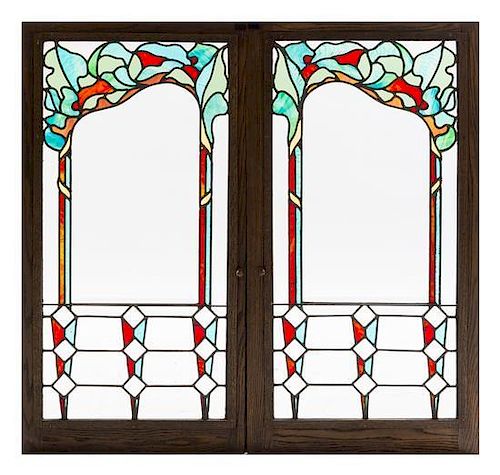 A Set of Four Leaded Glass Windows Largest: 37 3/4 x 20 inches.