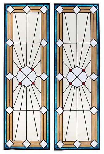 A Pair of Leaded Glass Windows Height 49 3/4 x width 15 1/2 inches.