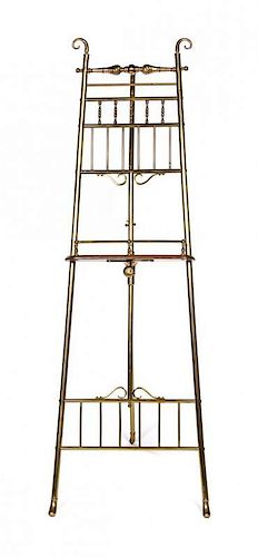 A Victorian Brass Easel Height 59 1/4 inches.