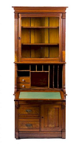 A Victorian Walnut Secretary Bookcase Height 80 3/4 x width 32 3/4 x depth 17 3/4 inches.
