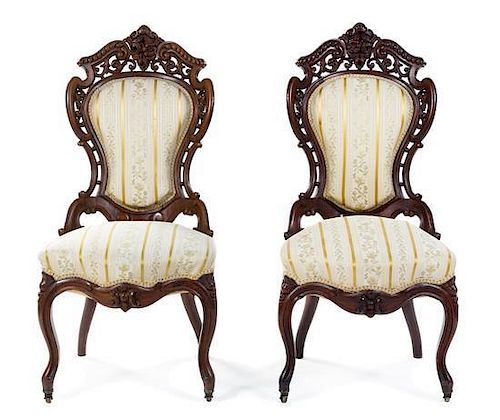 A Pair of Rococo Revival Rosewood Side Chairs Height 39 1/2 inches.